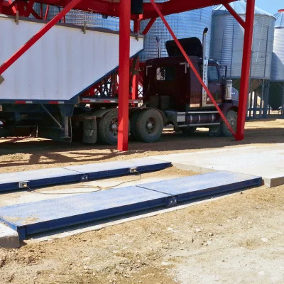Portable agricultural truck scale used for weighing grain and crop transport vehicles